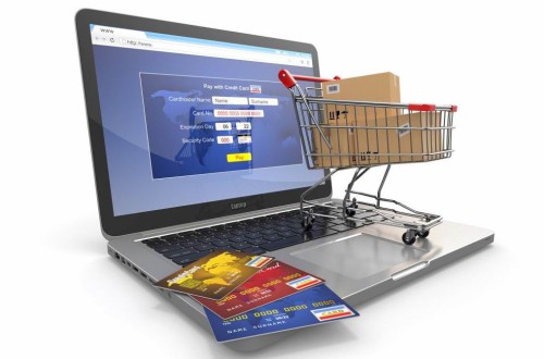 Ноутбук, пластиковые карты, тележка для товаров